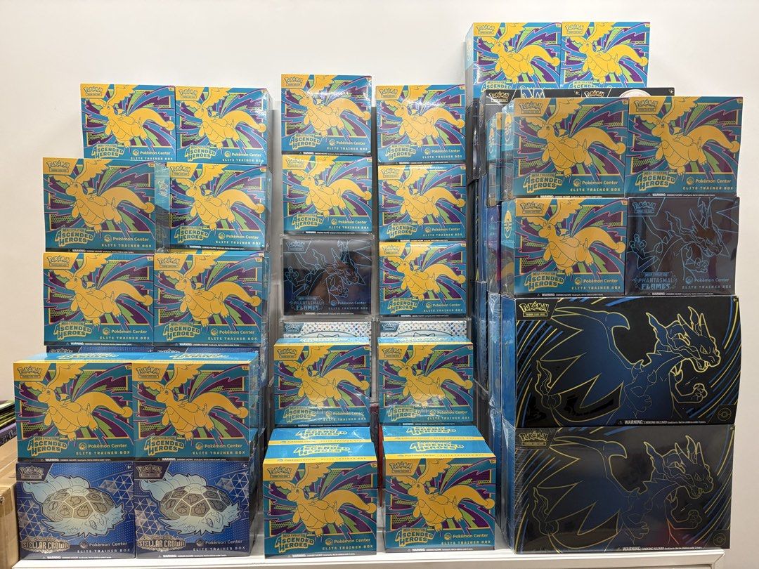 Retail shelf stocked with sealed Pokémon TCG Elite Trainer Boxes